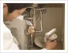 排水金具を取り外す